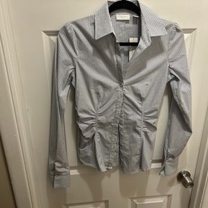 Button down business casual shirt.